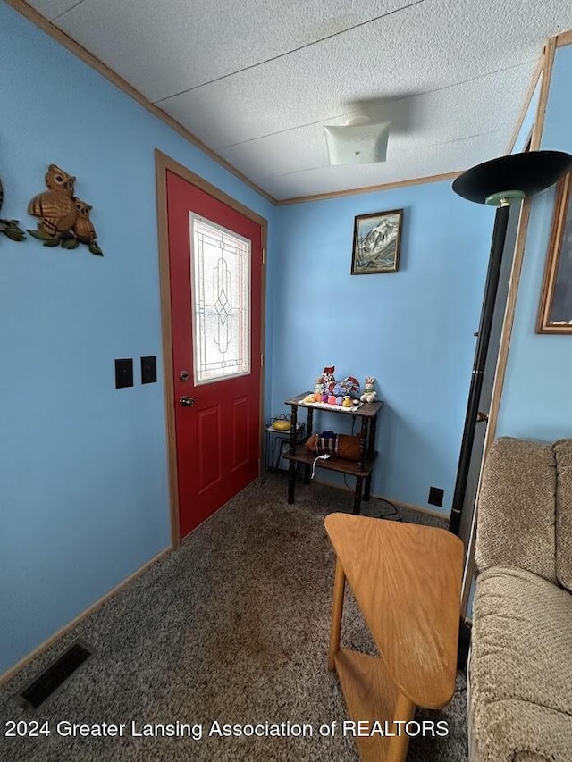 entryway featuring carpet floors