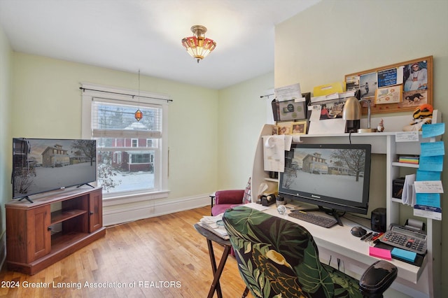 home office featuring light hardwood / wood-style flooring