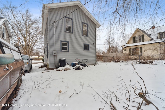 view of snow covered property