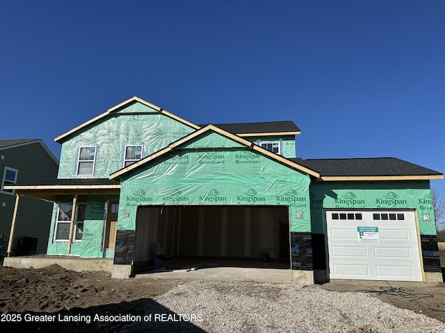 property under construction with a garage