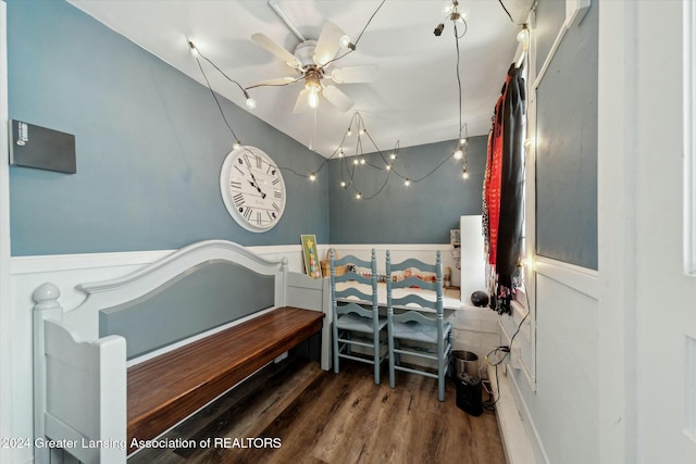 bedroom with dark hardwood / wood-style flooring