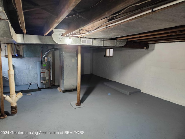 basement with heating unit and gas water heater