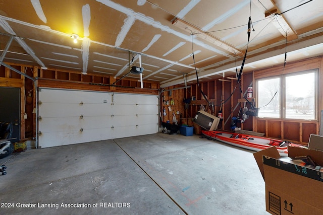 garage featuring a garage door opener