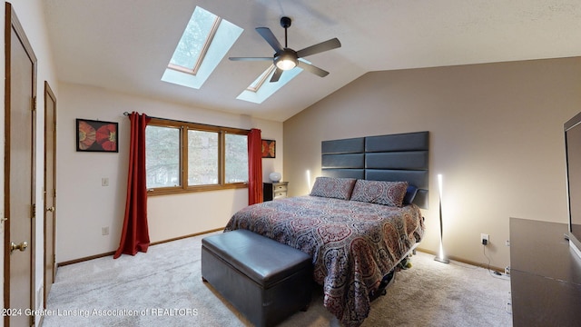 bedroom featuring lofted ceiling, light colored carpet, and ceiling fan