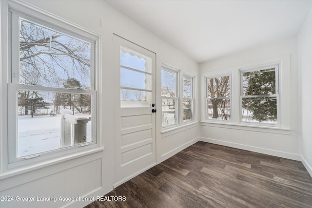 doorway to outside featuring dark hardwood / wood-style floors