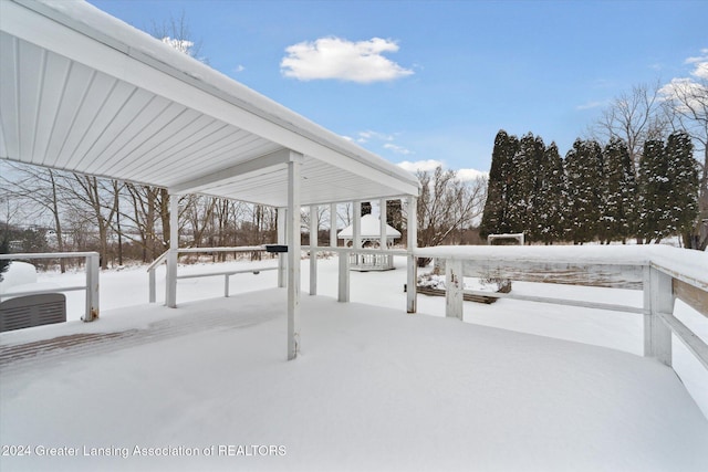 view of yard layered in snow