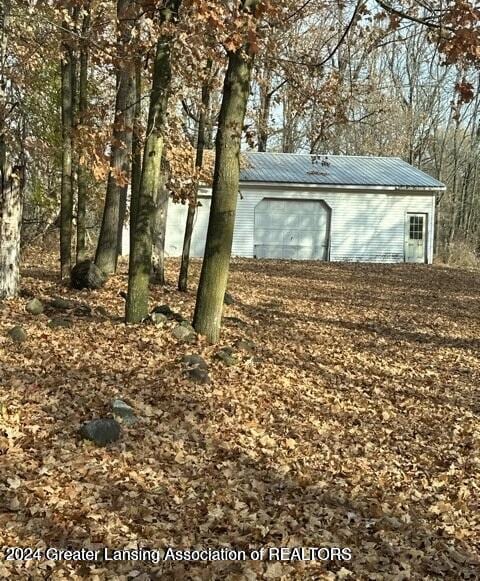 view of outdoor structure with a garage