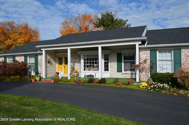 view of front of home featuring covered porch