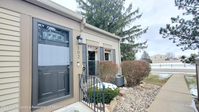 property entrance with cooling unit