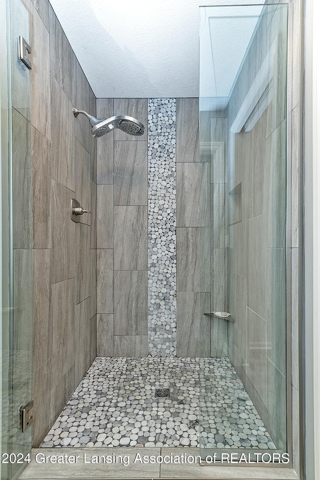 bathroom with an enclosed shower