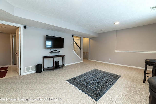 interior space featuring a textured ceiling