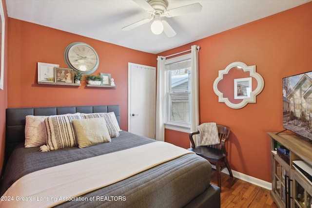 bedroom featuring ceiling fan and hardwood / wood-style floors