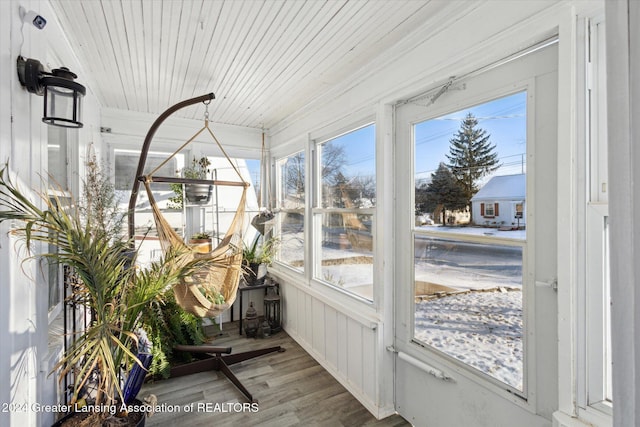 sunroom with wooden ceiling