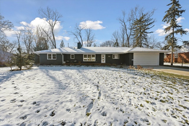 ranch-style house featuring a garage