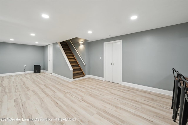 basement with light wood-type flooring