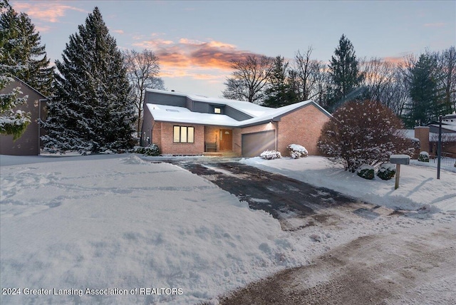 view of front of property with a garage