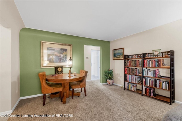 view of carpeted dining room