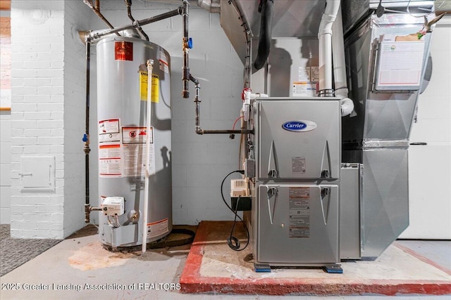 utility room featuring gas water heater