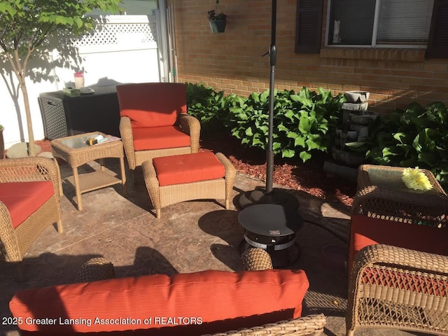 exterior space featuring a patio and outdoor lounge area