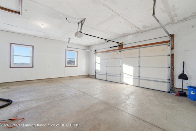 garage featuring a garage door opener