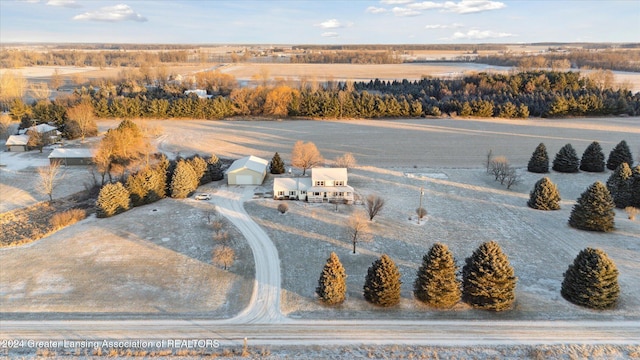 birds eye view of property with a rural view