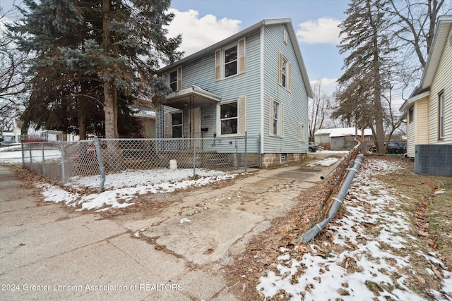 front of property featuring central AC