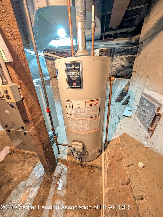 utility room featuring gas water heater