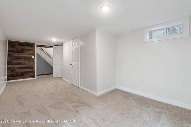 basement with light colored carpet