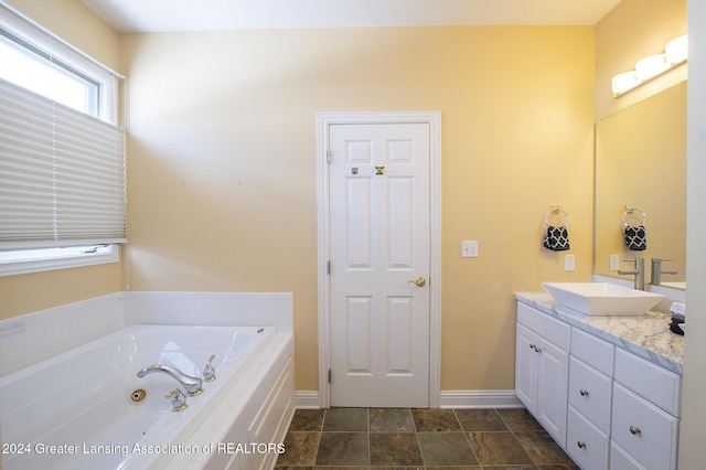 bathroom featuring a bathtub and vanity