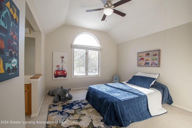 bedroom featuring lofted ceiling, carpet floors, and ceiling fan