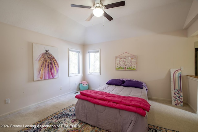 bedroom featuring lofted ceiling, ceiling fan, and light carpet