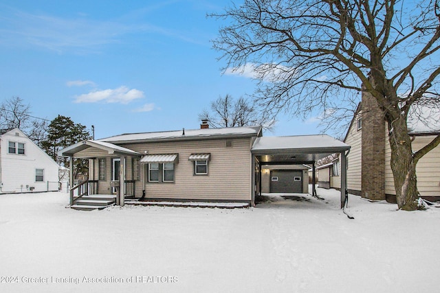 view of snow covered house