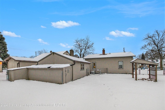 view of snow covered property