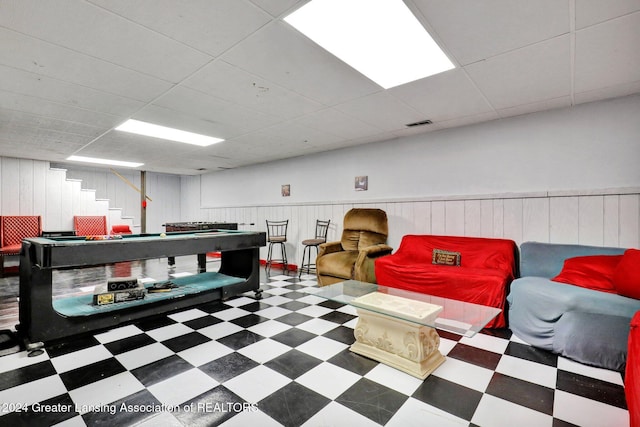 recreation room with pool table and a paneled ceiling