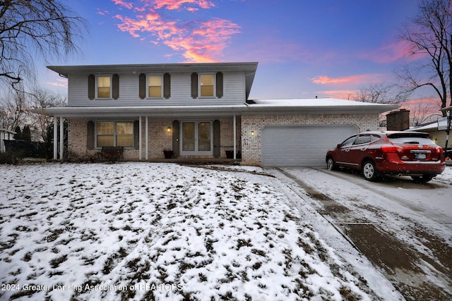 front of property featuring a garage