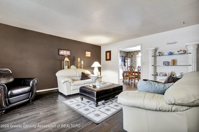 living room with dark hardwood / wood-style flooring