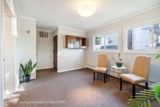 unfurnished room featuring dark colored carpet, crown molding, and a baseboard radiator