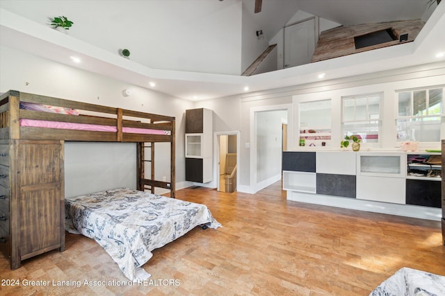 bedroom with a high ceiling