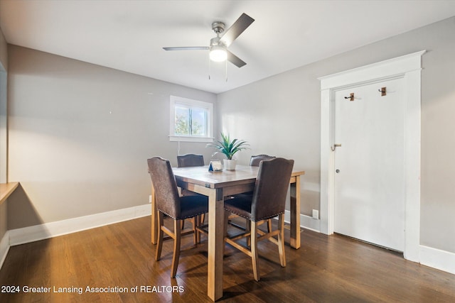 dining area featuring dark hardwood / wood-style floors and ceiling fan