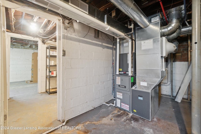 basement featuring heating unit