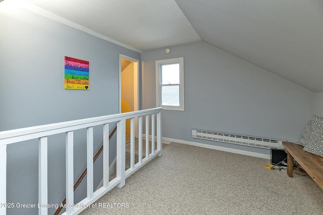 bonus room with a baseboard radiator, lofted ceiling, and carpet flooring