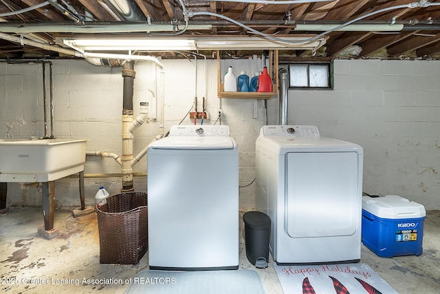 laundry room featuring washing machine and clothes dryer