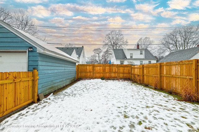 view of yard covered in snow