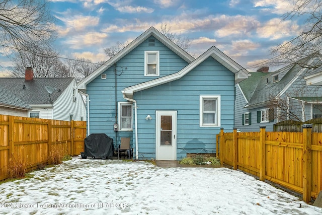 view of snow covered property