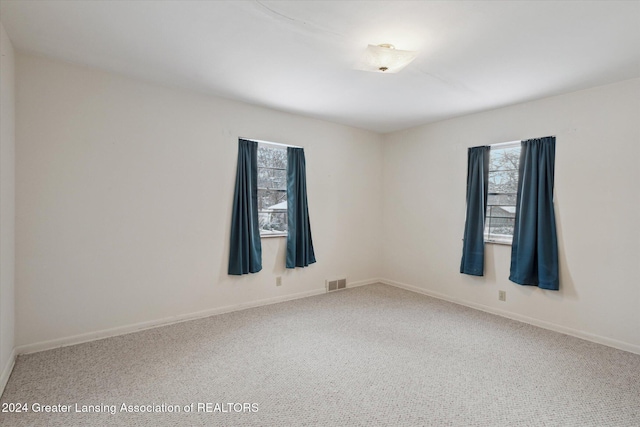 view of carpeted spare room