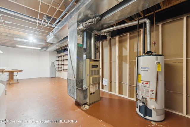 basement with water heater and heating unit