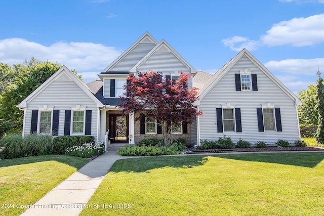 front facade featuring a front lawn