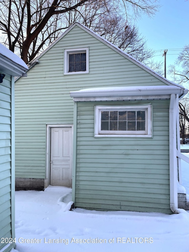 view of snow covered property