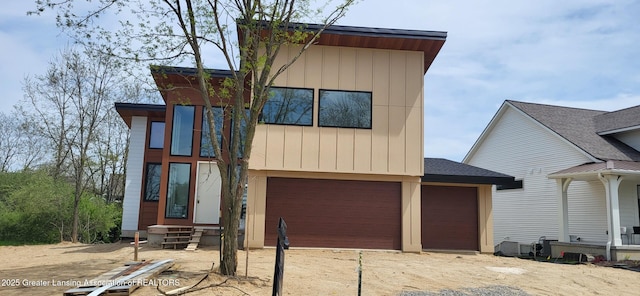 16925 Willowbrook Dr, Haslett, MI 48840 - contemporary home featuring a garage and driveway