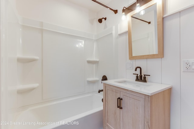 bathroom with vanity and shower / bath combination